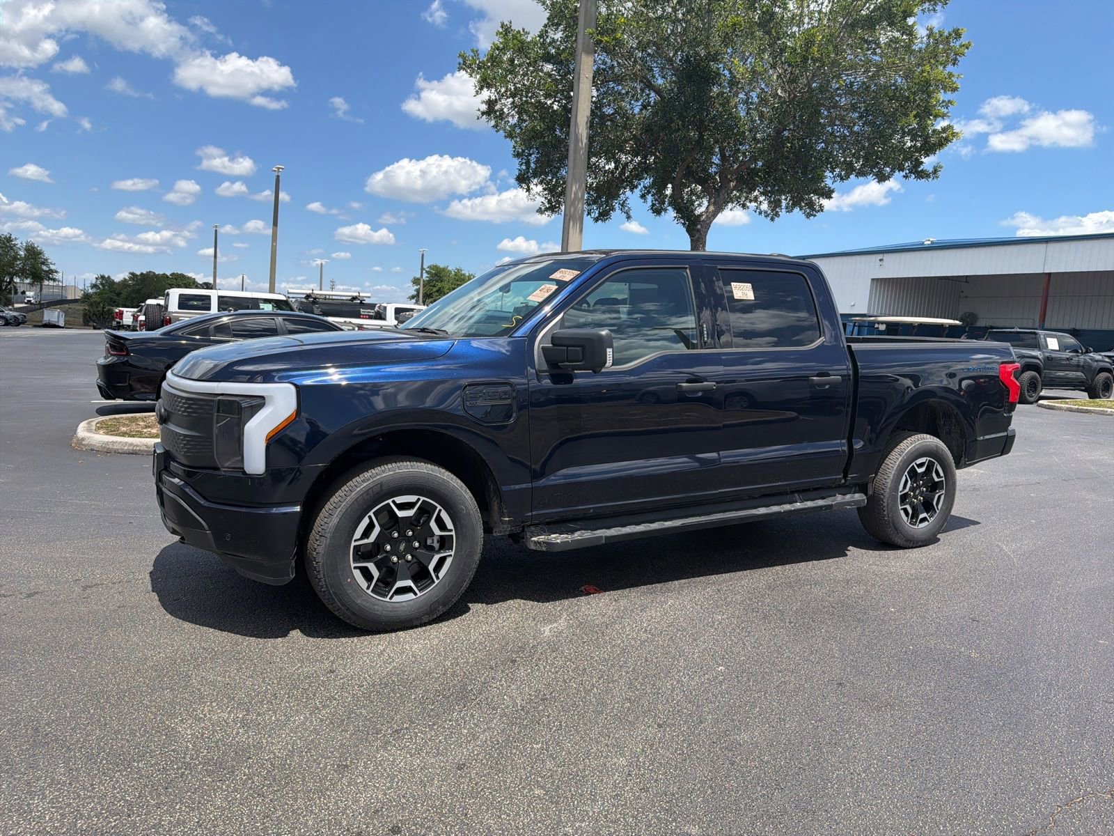 Certified 2023 Ford F150 Lightning XLT w/ Tow Technology Package AWD/4WD image 12