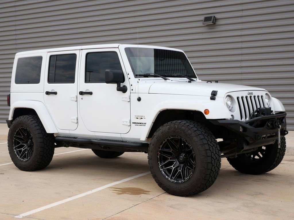 Used 2017 Jeep Wrangler Unlimited Sahara AWD/4WD image 1