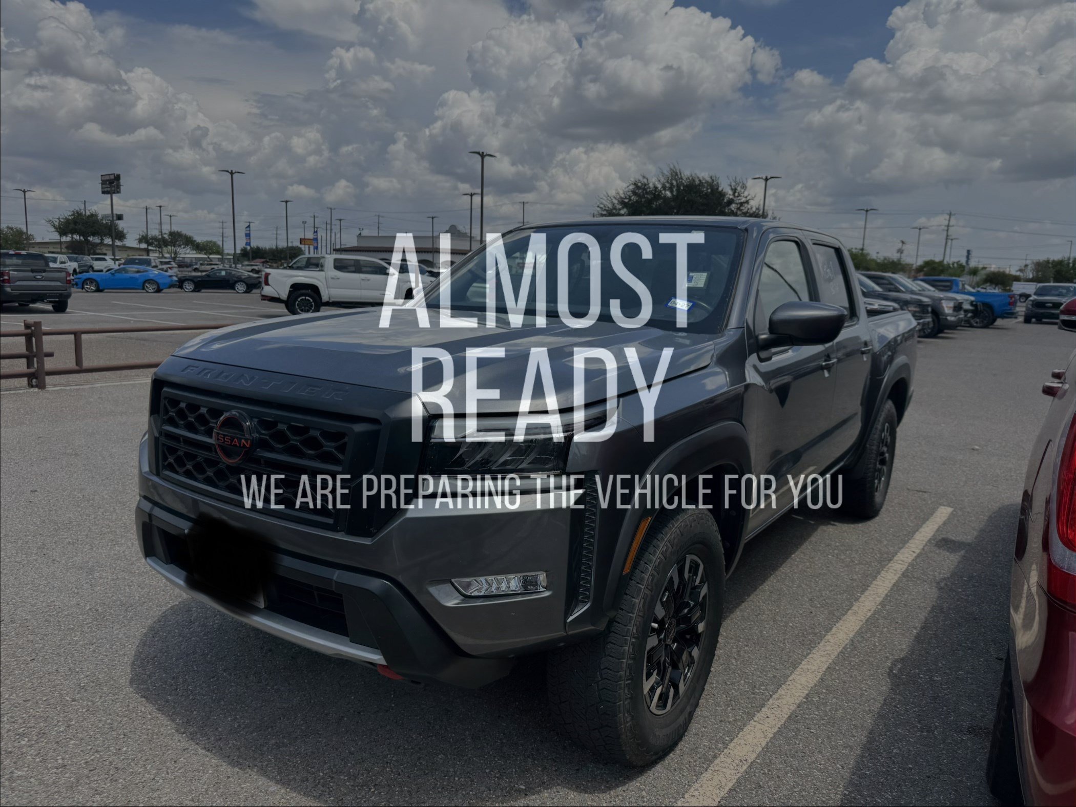 Used 2024 Nissan Frontier PRO-4X AWD/4WD image 2
