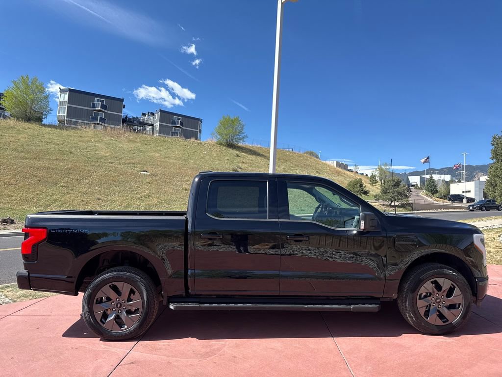 Certified 2023 Ford F150 Lightning XLT w/ Equipment Group 312A High image 6