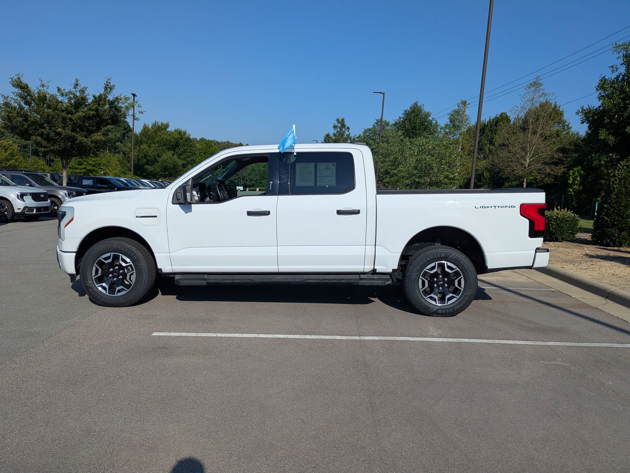 Certified 2023 Ford F150 Lightning XLT w/ Tow Technology Package AWD/4WD image 7