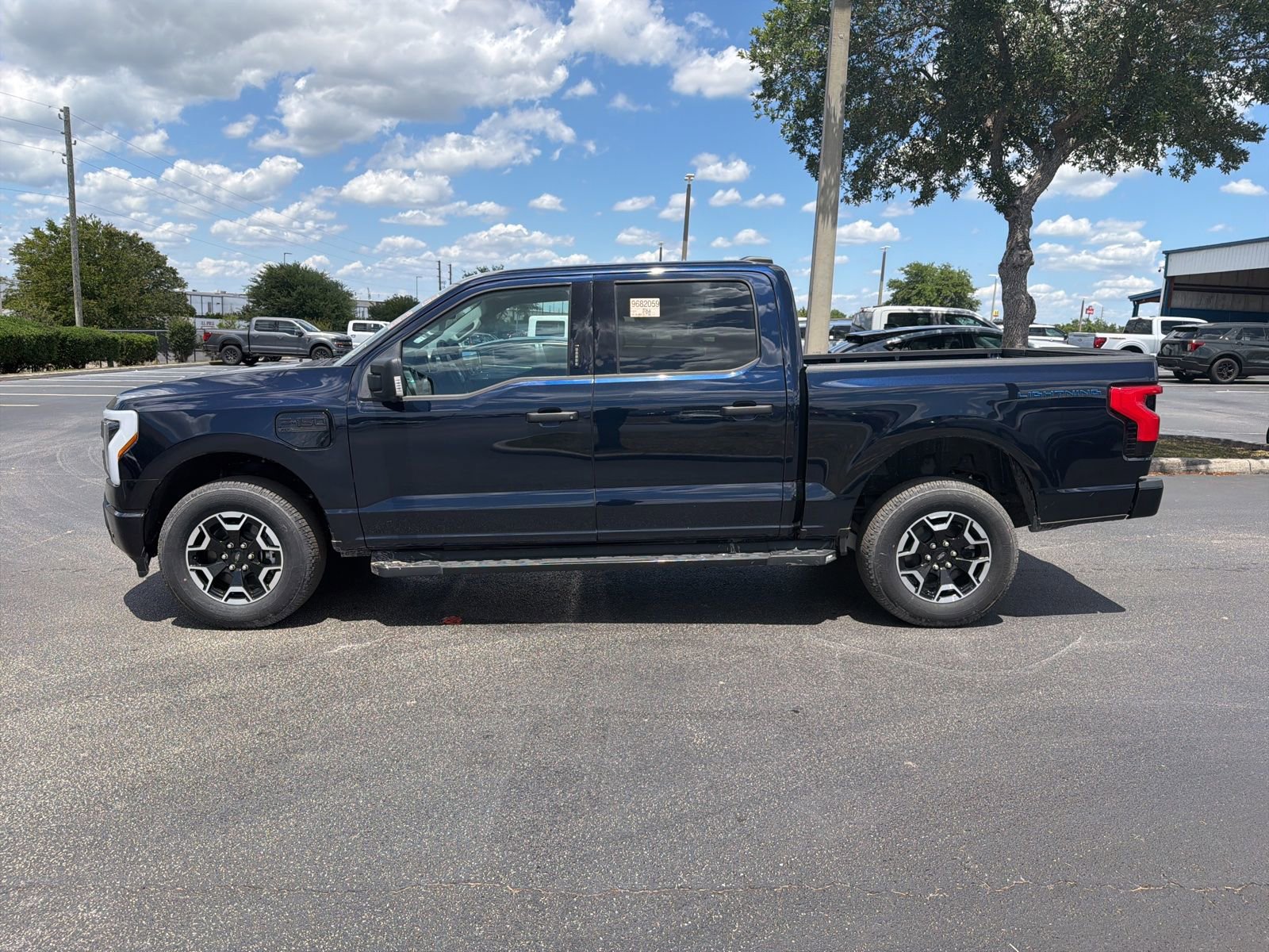Certified 2023 Ford F150 Lightning XLT w/ Tow Technology Package AWD/4WD image 10