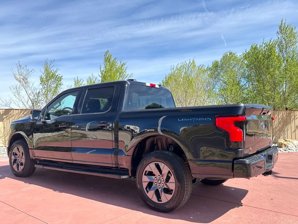 Certified 2023 Ford F150 Lightning XLT w/ Equipment Group 312A High image 3