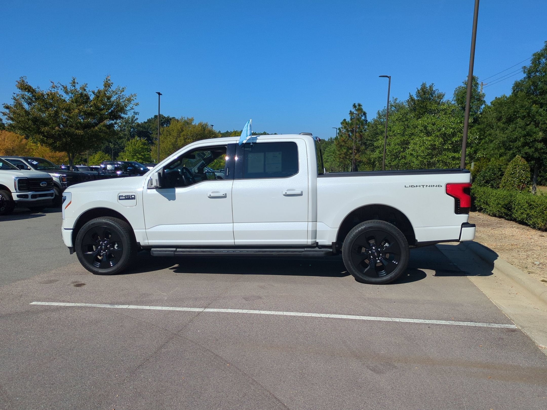Certified 2025 Ford F150 Lightning Platinum w/ Dark Elements Package AWD/4WD image 7