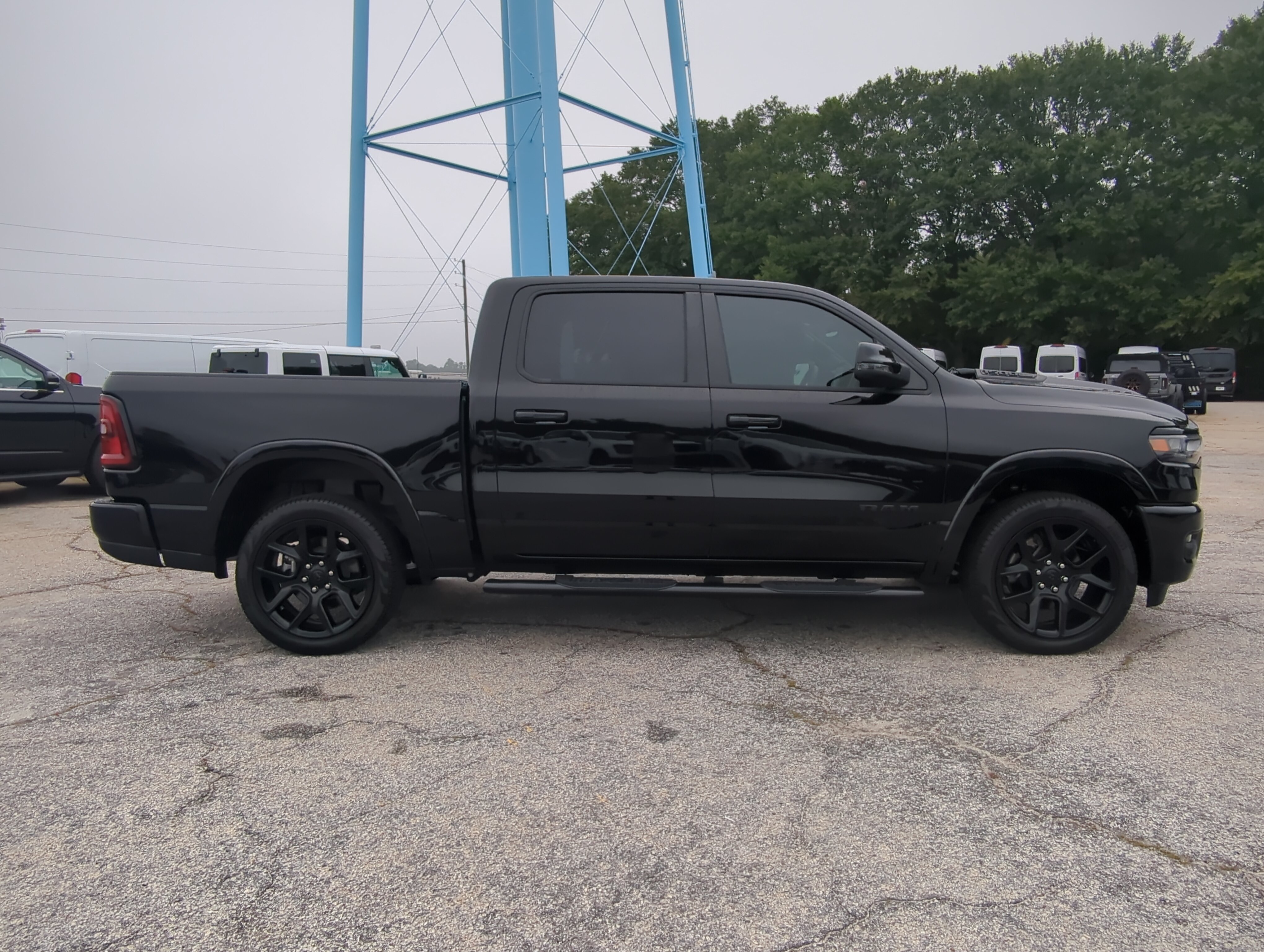 Used 2025 RAM 1500 Laramie w/ Night Edition AWD/4WD image 2