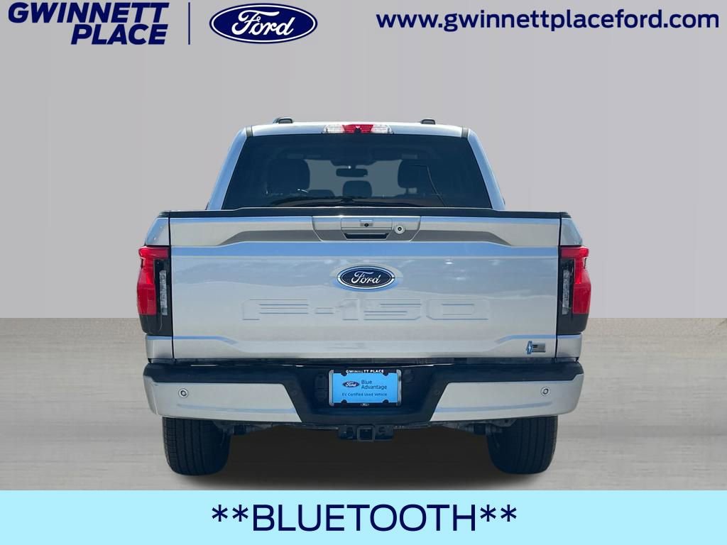 Certified 2023 Ford F150 Lightning XLT w/ Equipment Group 312A High image 6