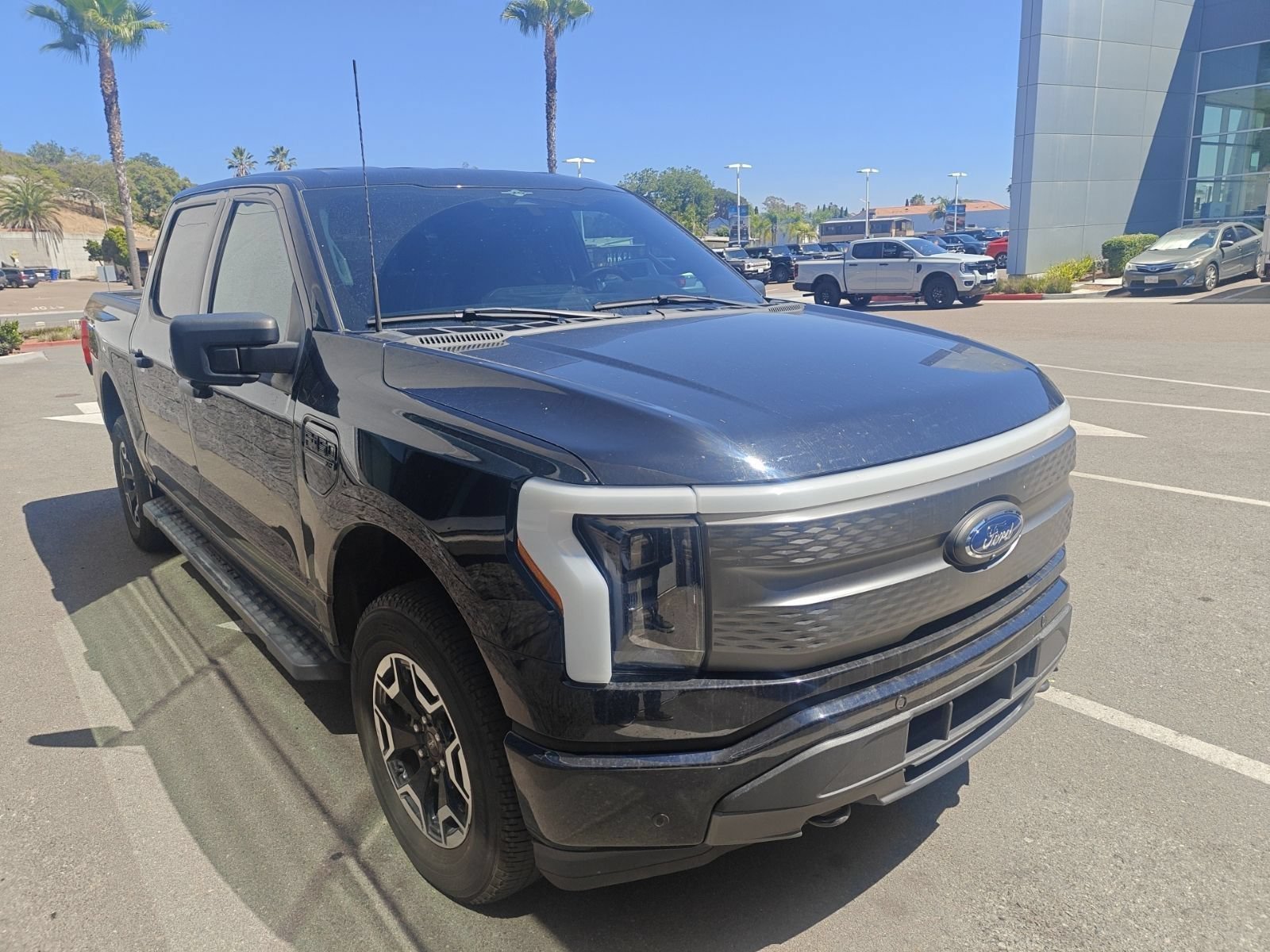 Certified 2023 Ford F150 Lightning XLT w/ Tow Technology Package AWD/4WD image 2
