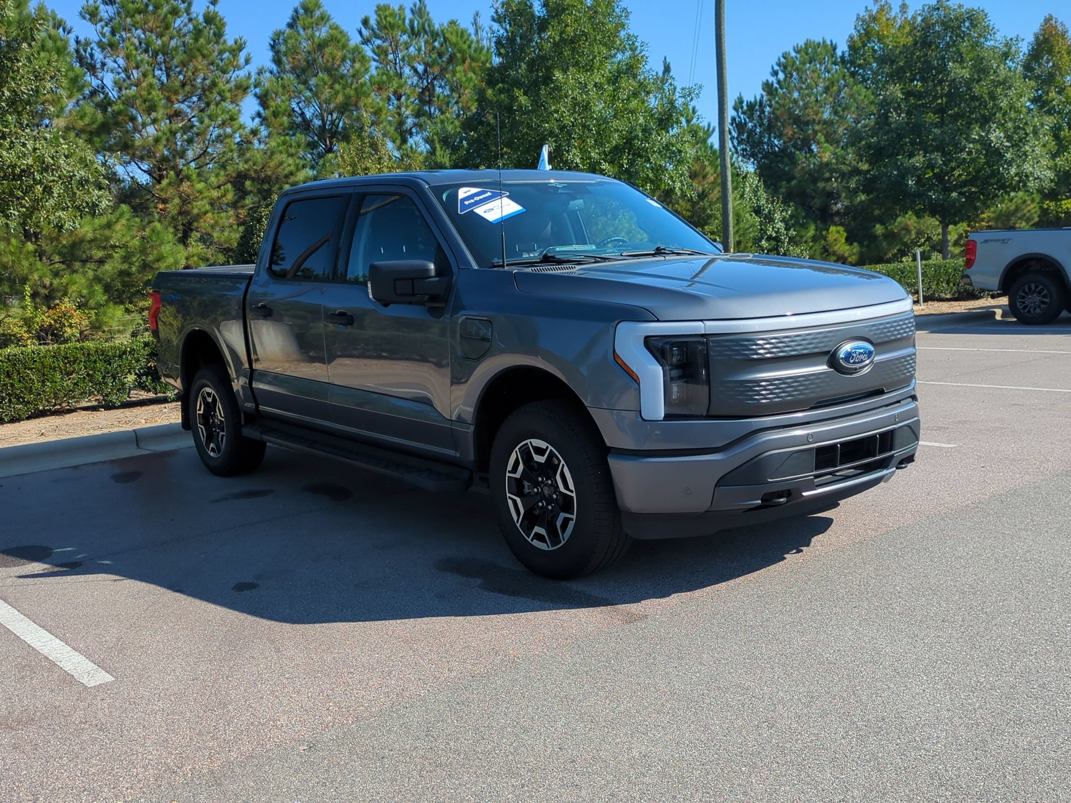 Certified 2023 Ford F150 Lightning XLT AWD/4WD image 1