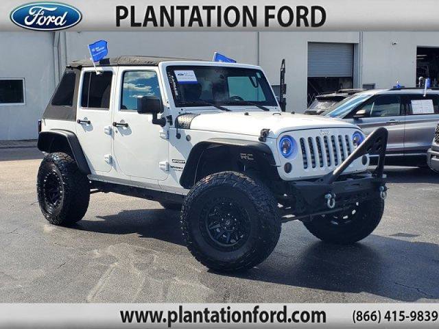 Used 2017 Jeep Wrangler Unlimited Sport w/ Mopar Black Appearance Group