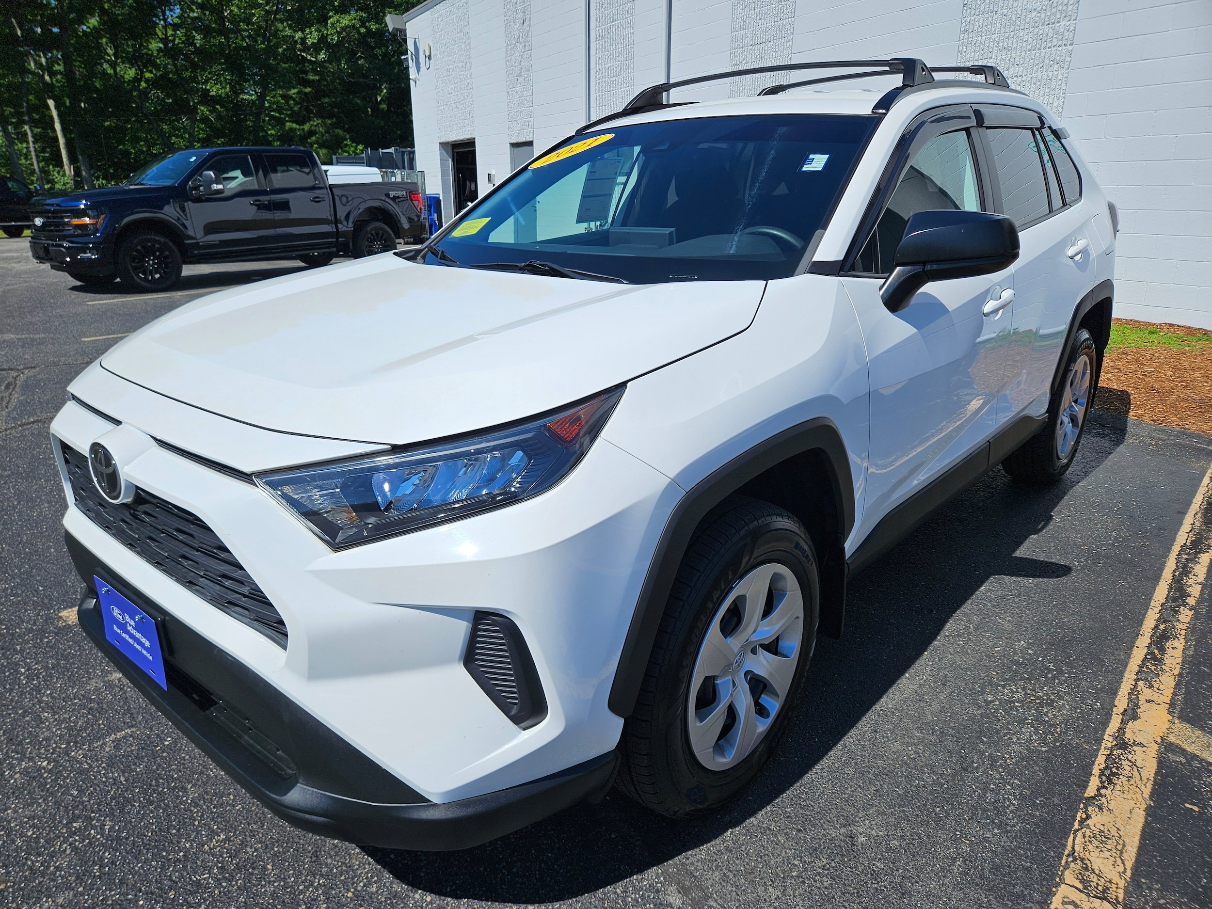Used 2021 Toyota RAV4 LE w/ Carpet Mat Package (TMS) AWD/4WD image 1