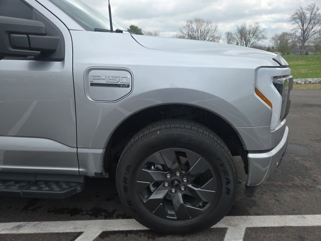 Certified 2023 Ford F150 Lightning XLT w/ Equipment Group 312A High image 4