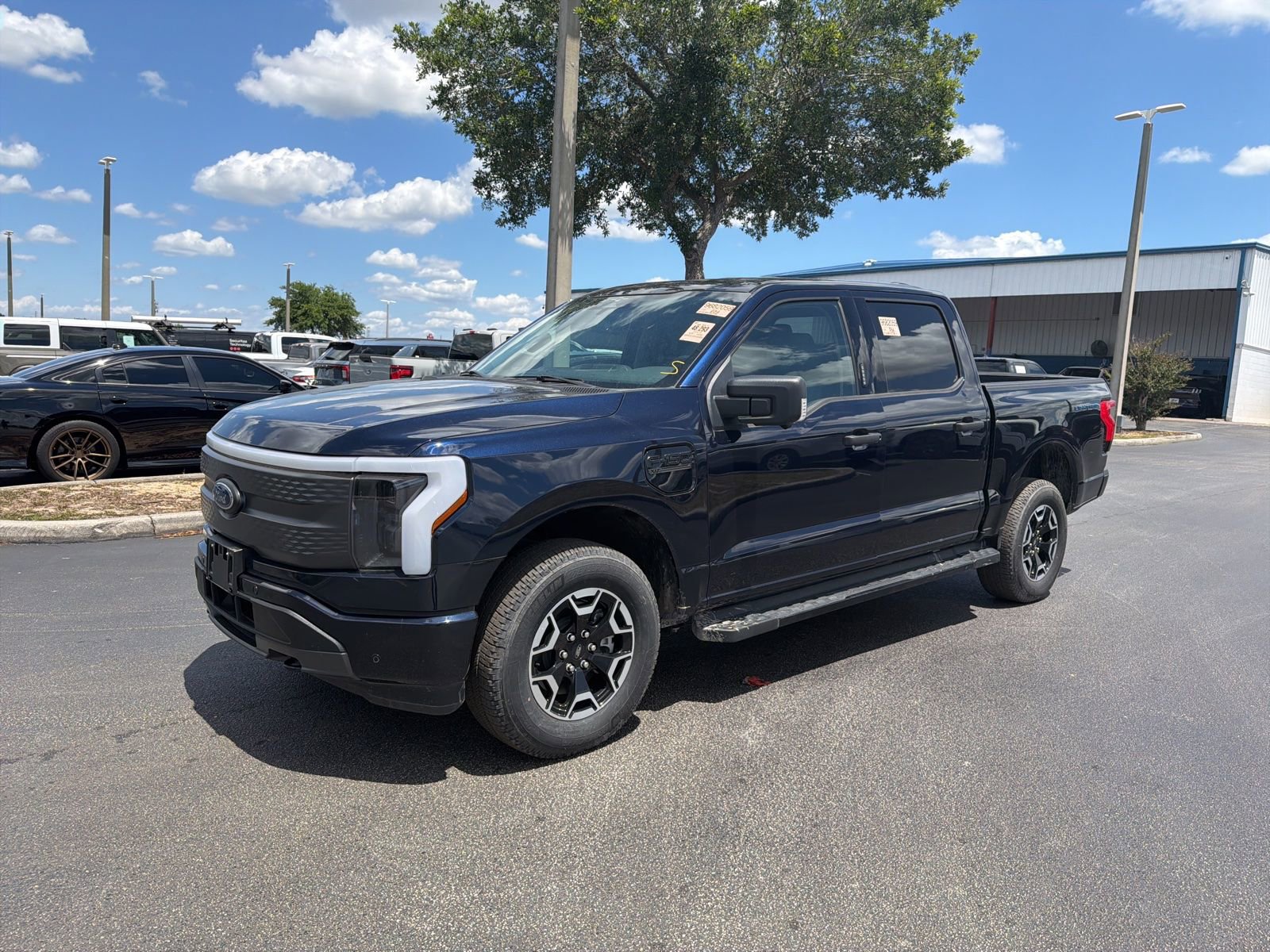Certified 2023 Ford F150 Lightning XLT w/ Tow Technology Package AWD/4WD image 13
