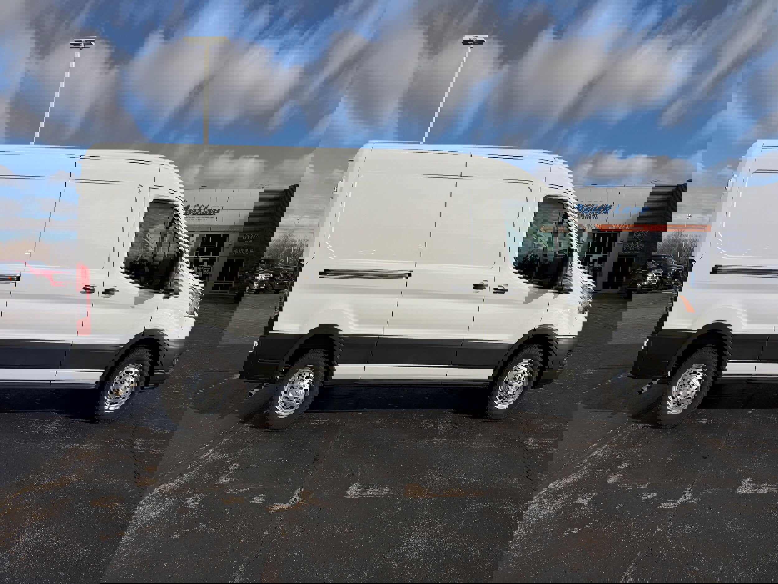 Certified 2022 Ford Transit 250 Medium Roof AWD w/ Load Area Protection Package image 2