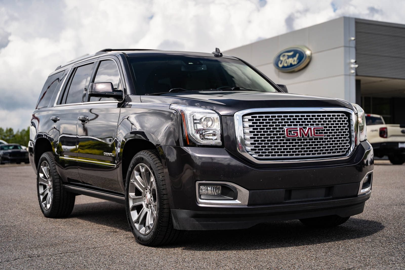 Used 2017 GMC Yukon Denali w/ Open Road Package RWD image 1